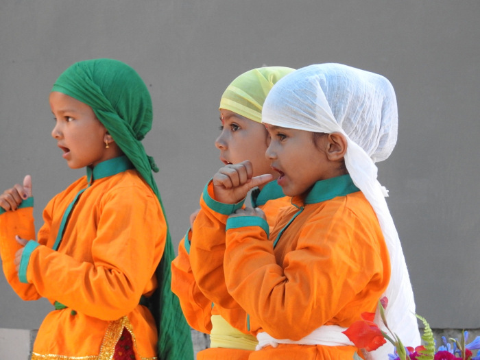 Students performing a Kumaoni Dance for a cultural performance. (Source; Chirag School)