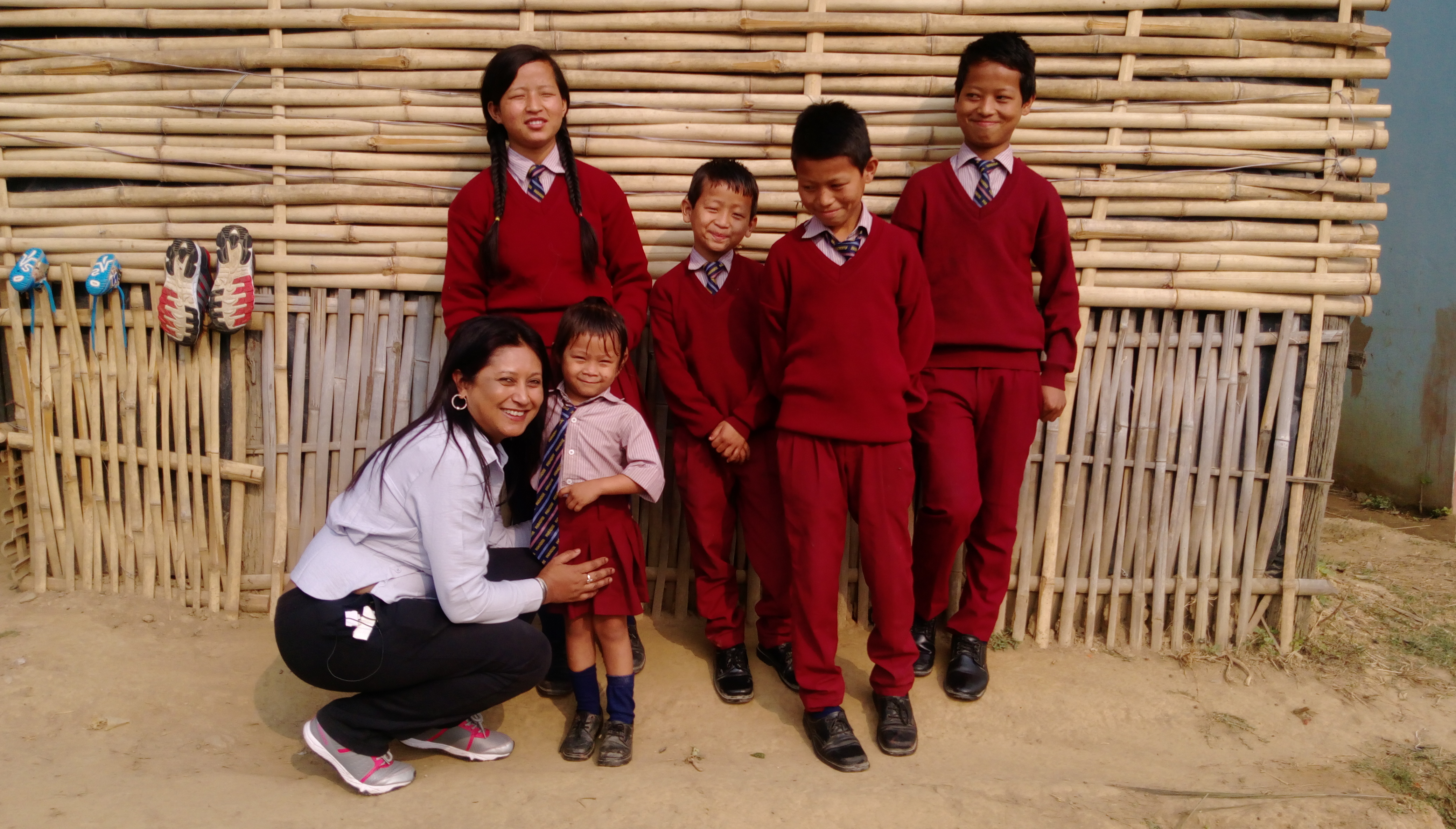 Hasina with some of the children who were rescued from the coal mines. They are now back in school.