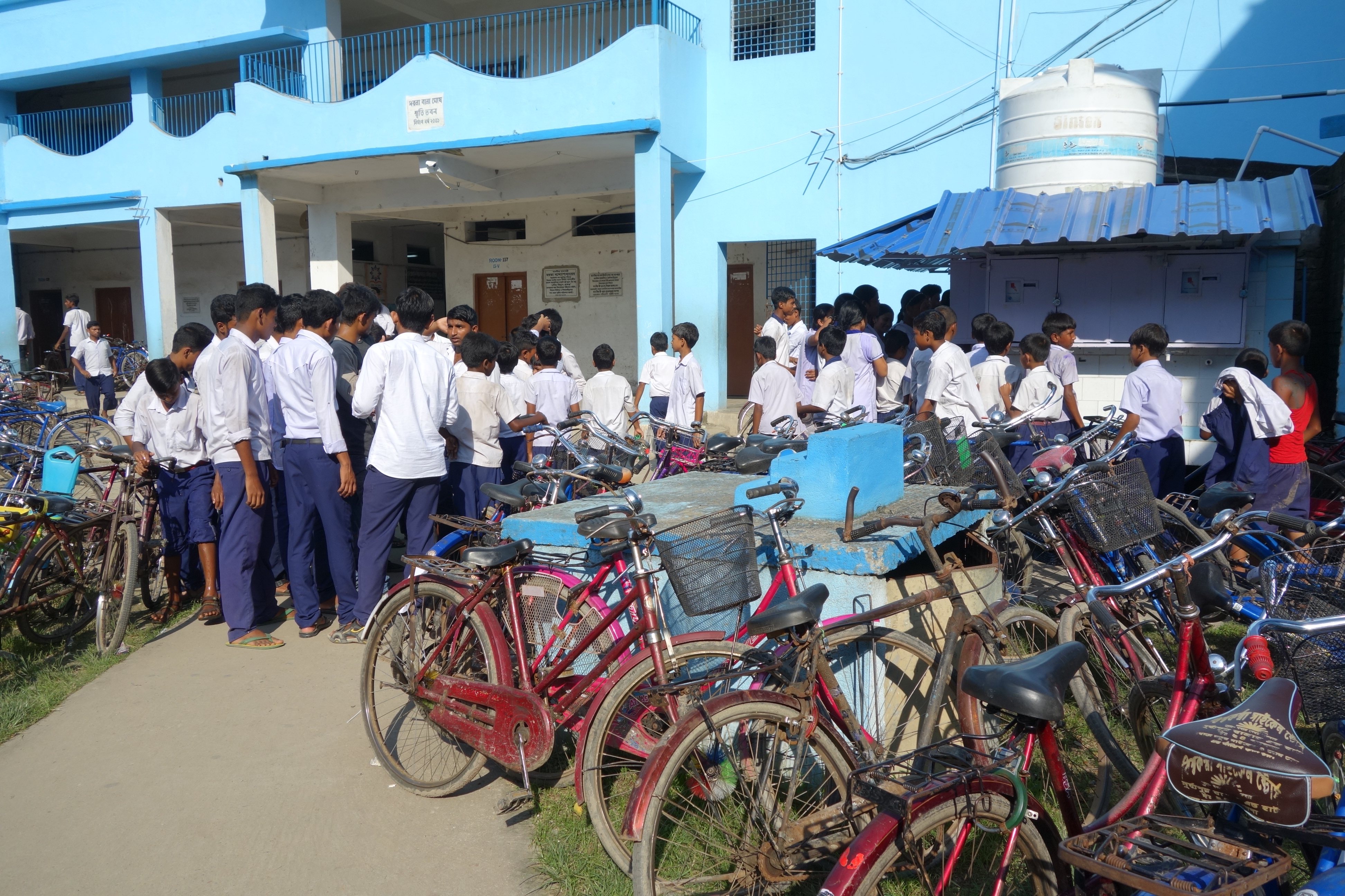 Water distribution to students of Dhapdhapi high school.